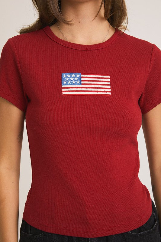 Red t-shirt with American flag design.