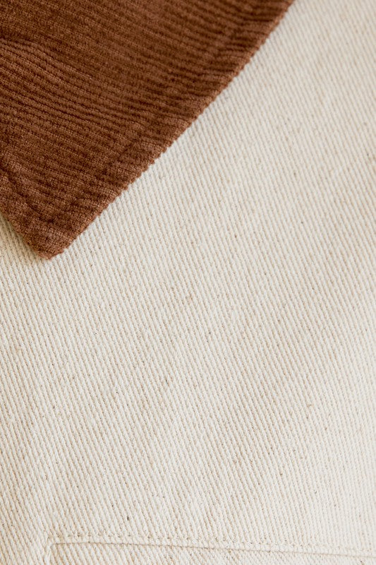 Close-up of a textured fabric with brown and beige colors.