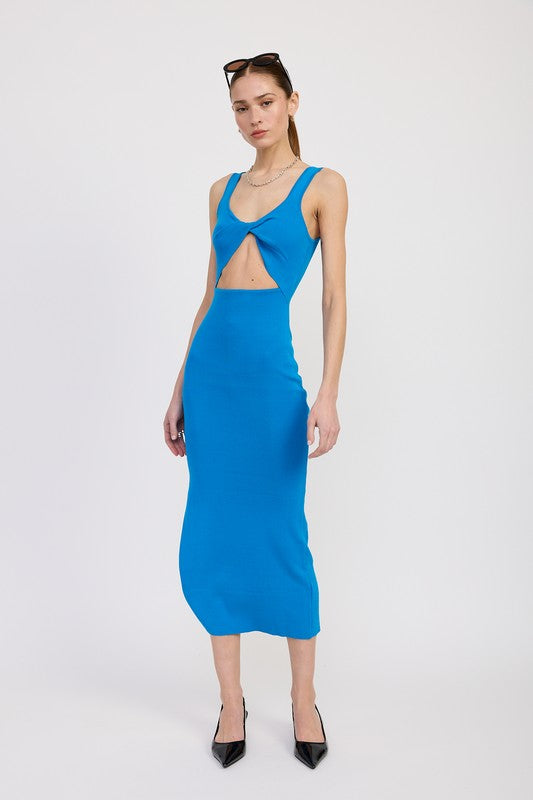 Woman wearing a blue dress with cut-out design on a white background