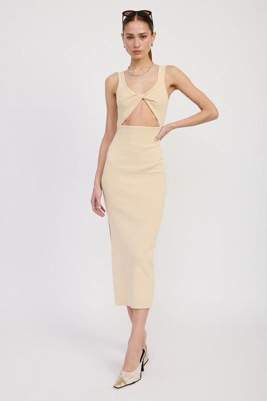 Woman wearing a light yellow dress with cut-out design on a white background