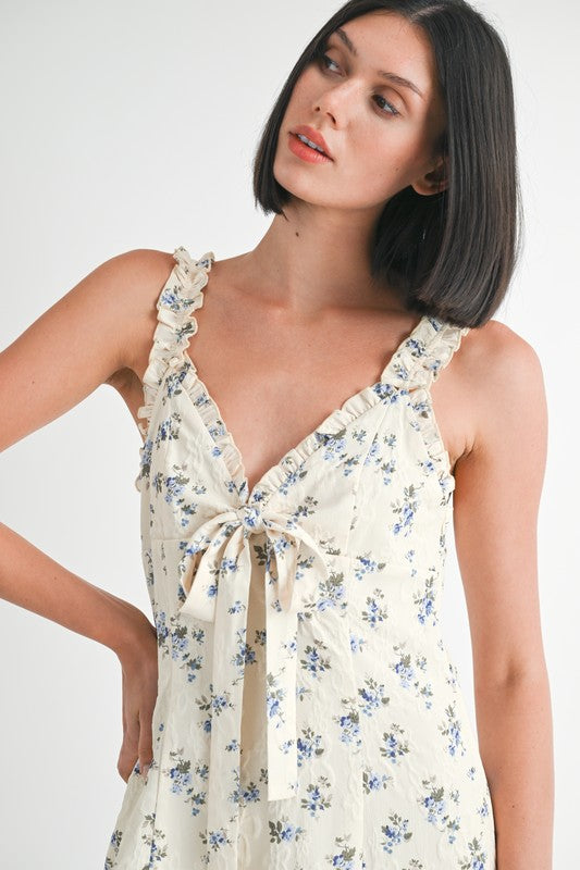 Woman wearing a floral dress on a white background