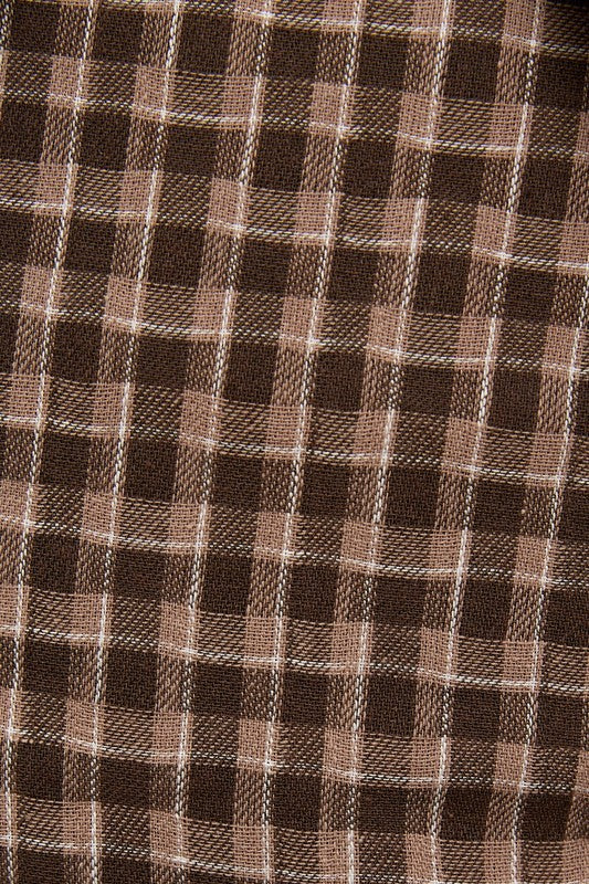 Close-up of brown and beige checkered fabric pattern
