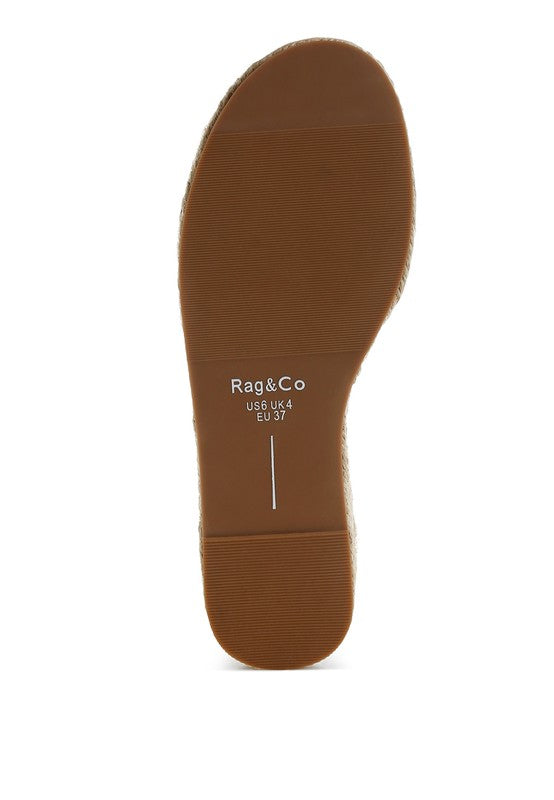 Brown shoe sole with 'Rag & Co' branding on a white background