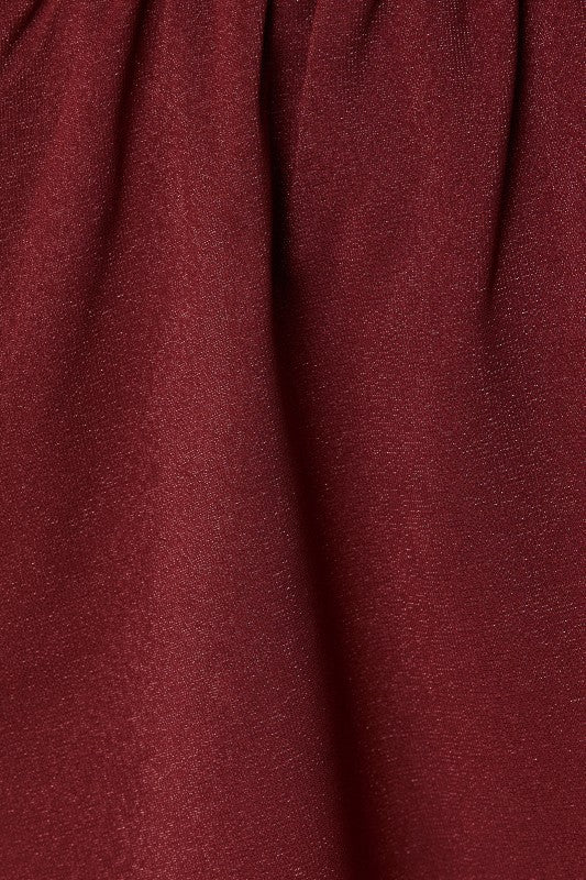 Close-up of a maroon fabric texture